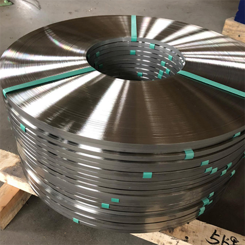 Deburring stainless steel strip production